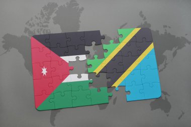 bir dünya haritası arka plan üzerinde ürdün ve tanzanya ulusal bayrağı ile bulmaca.