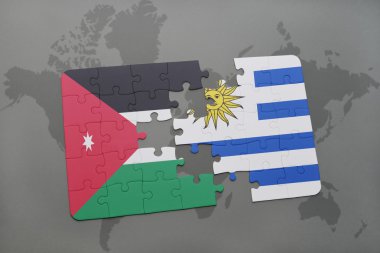 bir dünya haritası arka plan üzerinde ürdün ve Uruguay ulusal bayrağı ile bulmaca.