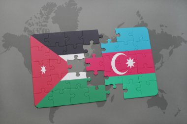 ürdün ve azerbaycan ulusal bayrağı ile bulmaca bir dünya haritası arka plan üzerinde.