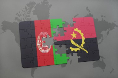bir dünya haritası arka plan üzerinde Afganistan ve angola ulusal bayrağı ile bulmaca.