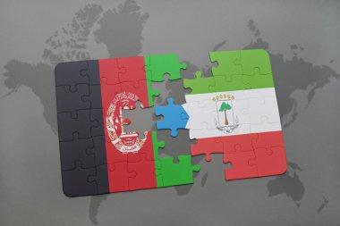 bir dünya haritası arka plan üzerinde afganistan ve ekvator ginesi ulusal bayrağı ile bulmaca.