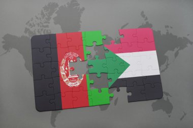 bir dünya haritası arka plan üzerinde Afganistan ve Sudan ulusal bayrağı ile bulmaca.