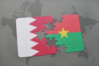 bir dünya haritası arka plan üzerinde bahreyn ve burkina faso ulusal bayrağı ile bulmaca.