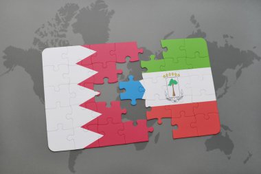 bir dünya haritası arka plan üzerinde bahreyn ve ekvator ginesi ulusal bayrağı ile bulmaca.