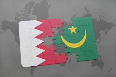 bir dünya haritası arka plan üzerinde bahreyn ve moritanya ulusal bayrağı ile bulmaca.