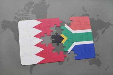 bir dünya haritası arka plan üzerinde bahreyn ve güney Afrika ulusal bayrağı ile bulmaca.