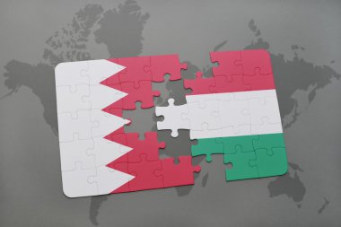 bir dünya haritası arka plan üzerinde bahreyn ve macaristan ulusal bayrağı ile bulmaca.