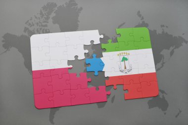 bir dünya haritası arka plan üzerinde polonya ve ekvator ginesi ulusal bayrağı ile bulmaca. 3d illüstrasyon