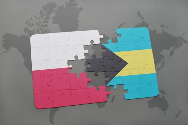 Puzzle s národní vlajkou Polska a Bahamy na pozadí světové mapy. 3D ilustrace — Stock fotografie