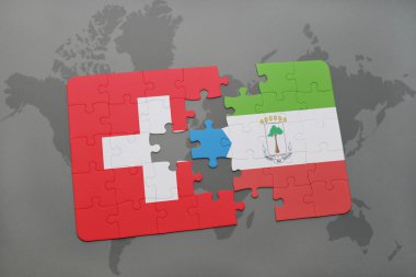 bir dünya haritası arka plan üzerinde İsviçre ve ekvator ginesi ulusal bayrağı ile bulmaca.