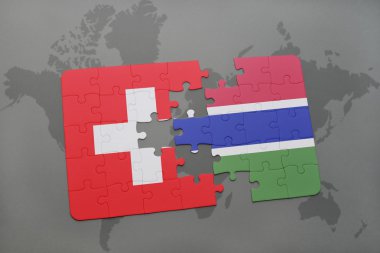 bir dünya haritası arka plan üzerinde İsviçre ve gambiya ulusal bayrağı ile bulmaca.