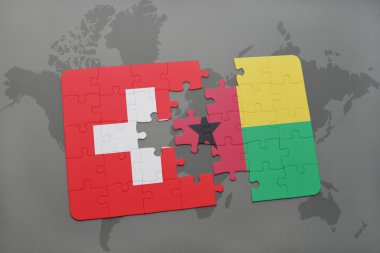 bir dünya haritası arka plan üzerinde İsviçre ve gine bissau ulusal bayrağı ile bulmaca.