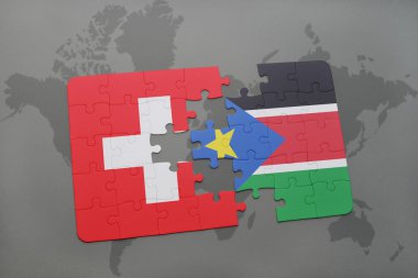bir dünya haritası arka plan üzerinde İsviçre ve güney sudan ulusal bayrağı ile bulmaca.