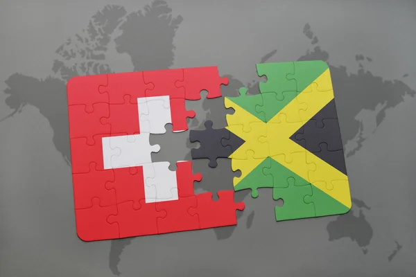 Rompecabezas con la bandera nacional de Suiza y Jamaica en un mapa del mundo fondo . — Foto de Stock