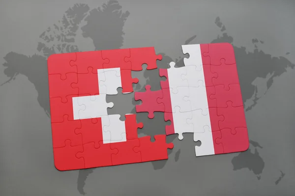 Головоломка з національним прапором Швейцарії та Перу на карті світу. — стокове фото