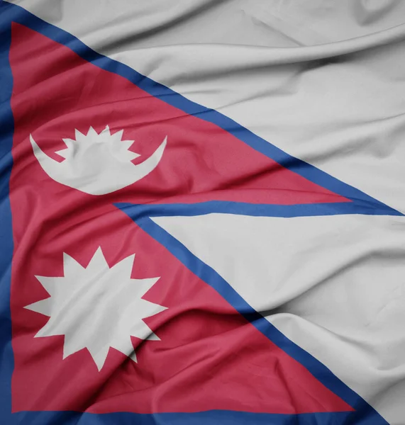 Размахивая Красочным Национальным Флагом Непала Макроснимок — стоковое фото