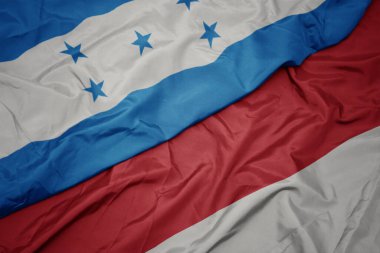 Endonezya 'nın renkli bayrağı ve Honduras' ın ulusal bayrağı. makro