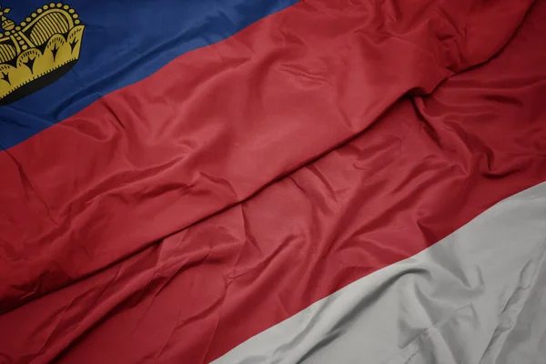 Waving Colorful Flag Indonesia National Flag Liechtenstein Macro — Stock Photo, Image