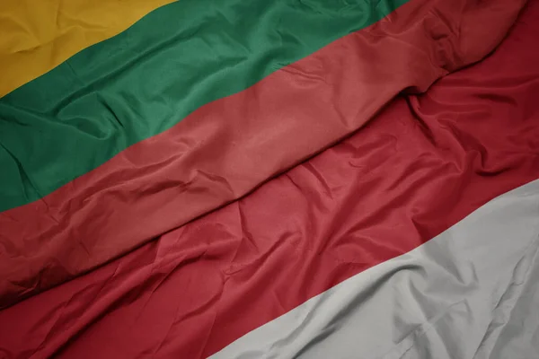 Viftande Färgglada Flagga Indonesien Och Nationell Flagga Lithuania Makro — Stockfoto