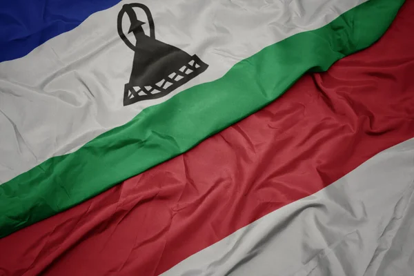 Színes Indonéziai Zászlót Lobogtatva Nemzeti Lesotho Zászlót Lobogtatva Makroszintű — Stock Fotó