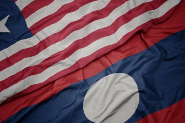 Laos 'un renkli bayrağı ve Liberya' nın ulusal bayrağı sallanıyordu. makro