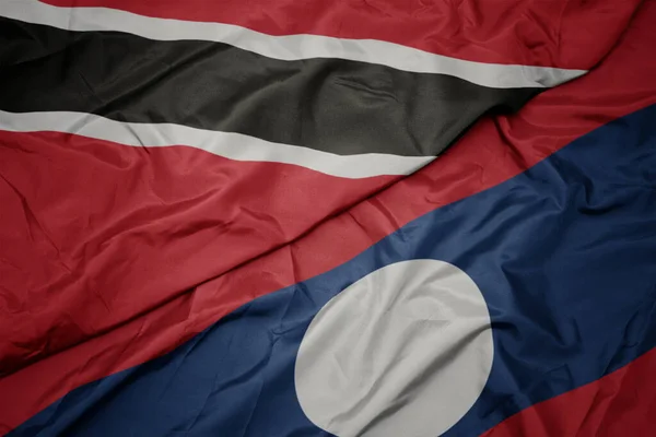 Macha Kolorowa Flaga Laosu Flaga Narodowa Trynidadu Tobago Makro — Zdjęcie stockowe