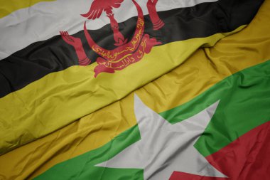 Myanmar 'ın renkli bayrağı ve brunei' nin ulusal bayrağı sallanıyor. makro