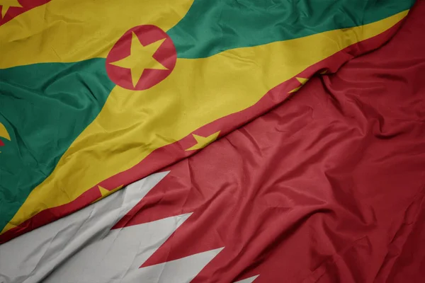 Bahreyn Renkli Bayrağını Sallıyor Grenada Nın Ulusal Bayrağını Taşıyor Makro — Stok fotoğraf