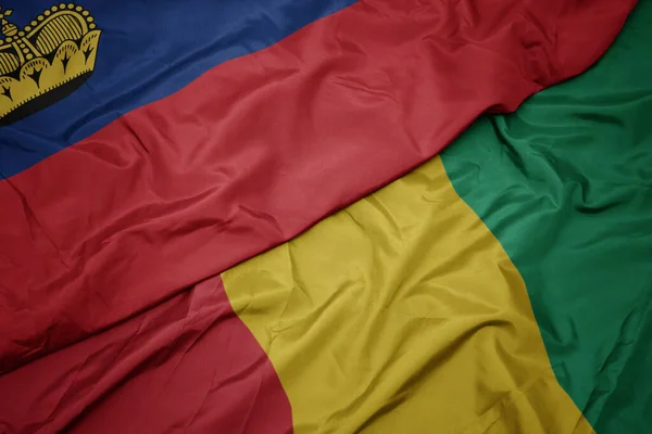 Waving Colorful Flag Guinea National Flag Liechtenstein Macro — Stock Photo, Image