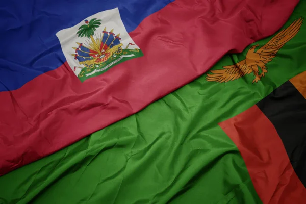 Κυματίζει Πολύχρωμη Σημαία Της Ζάμπια Και Εθνική Σημαία Της Αϊτής — Φωτογραφία Αρχείου