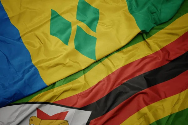 Machając Kolorową Flagą Zimbabwe Flagą Narodową Świętego Vincenta Granatów Makro — Zdjęcie stockowe