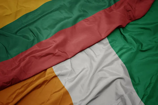 Viftande Färgglada Flagga Cote Divoire Och Nationell Flagga Lithuania Makro — Stockfoto