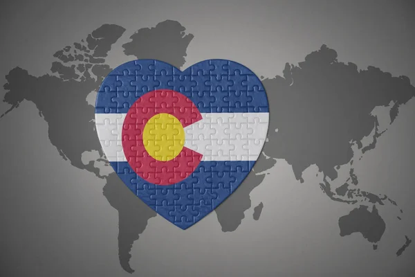 Coração Quebra Cabeça Com Bandeira Estado Colorado Fundo Mapa Mundo Imagem De Stock