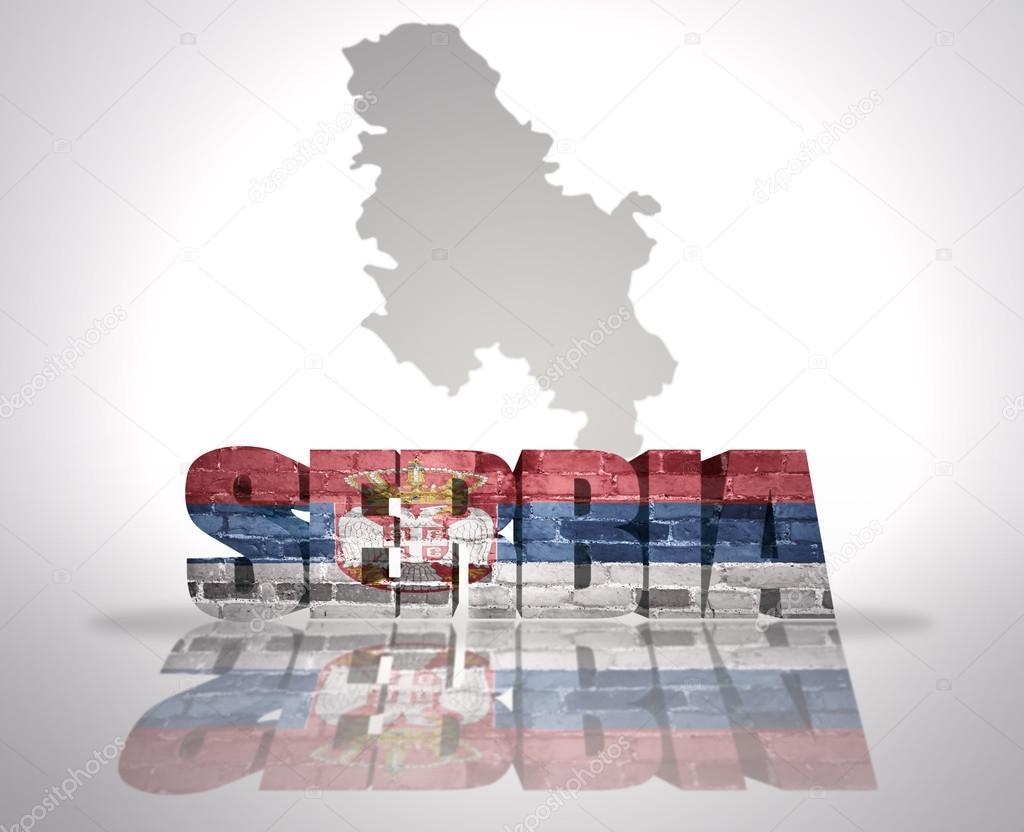 Word Serbia on a map background