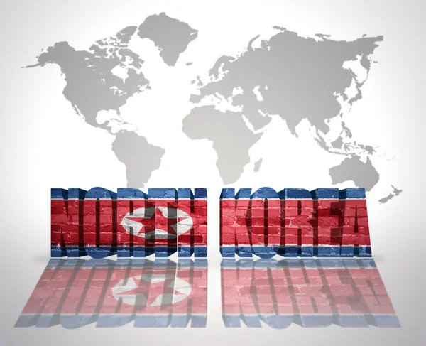 Word Noord-Korea op een wereld kaart achtergrond — Stockfoto