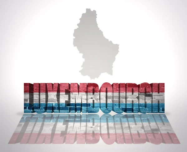 Word Luxemburg op de achtergrond van een kaart — Stockfoto