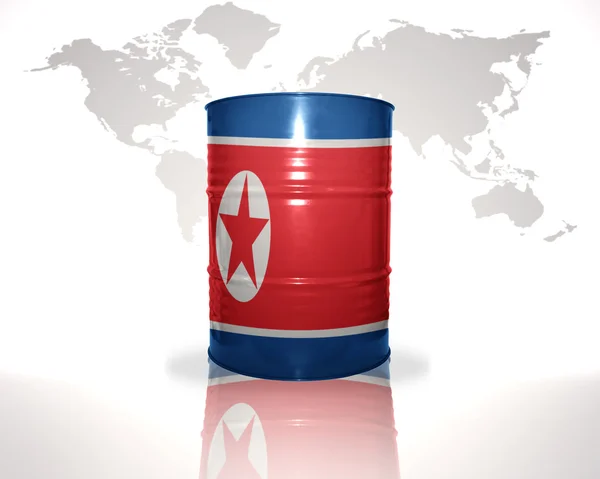 Barrel with north korea flag on the world map background — Stock Photo, Image
