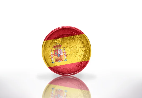 Moeda em euros com bandeira espanhola no fundo branco — Fotografia de Stock