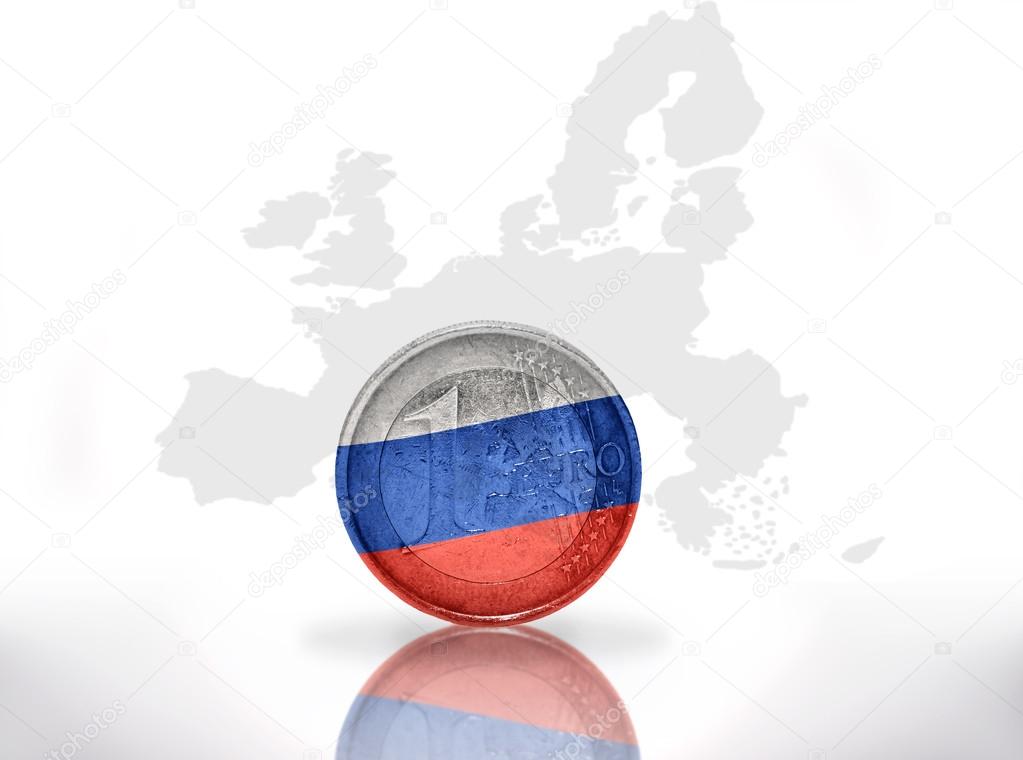 euro coin with russian flag on the european union map background