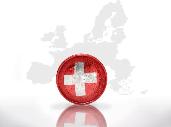 Euro coin with swiss flag on the european union map background — Stock Photo, Image