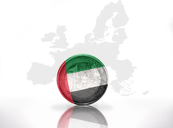 Euro coin with united arab emirates flag on the european union map background — Stock Photo, Image