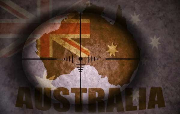 Sniper scope aimed at the vintage australian flag and map — Stock Photo, Image