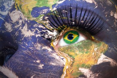  woman's  face with planet Earth texture and brazilian flag inside the eye. clipart