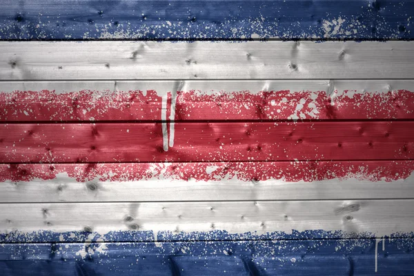 Painted costa rica flag on a wooden texture — Stock Photo, Image