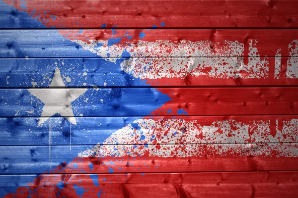 Bandiera dipinta puerto rico su una texture in legno — Foto Stock