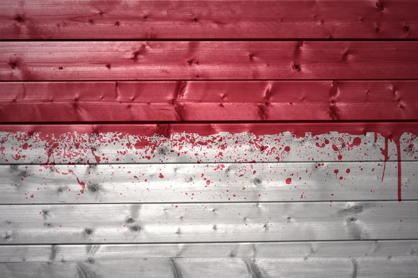 Bandeira indonésia pintada em uma textura de madeira — Fotografia de Stock