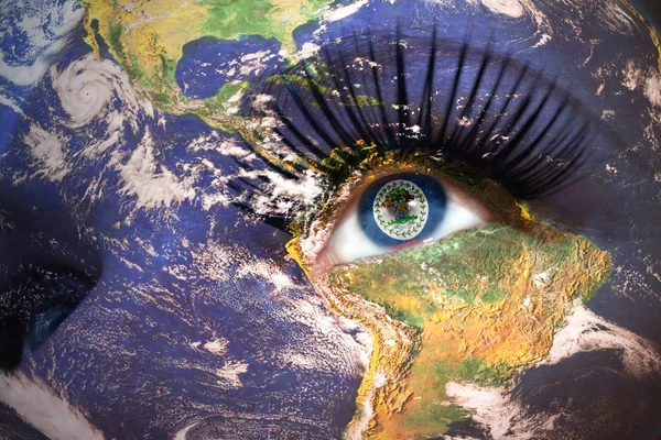 Womans face with planet Earth texture and belize flag inside the eye — Stockfoto