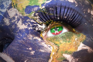 womans face with planet Earth texture and myanmar flag inside the eye.