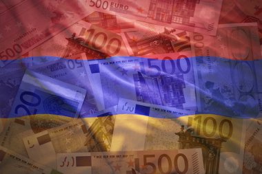 colorful waving armenian flag on a euro money background