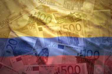 colorful waving colombian flag on a euro money background